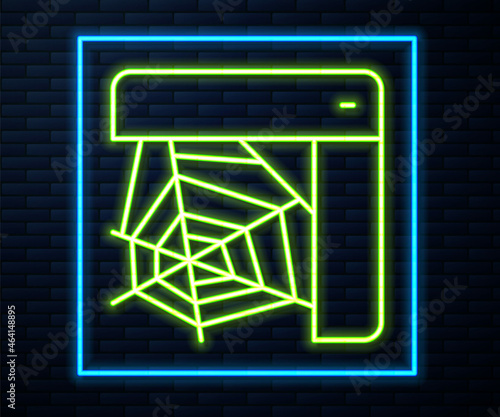 Glowing neon line Spider web icon isolated on brick wall background. Cobweb sign. Happy Halloween party. Vector