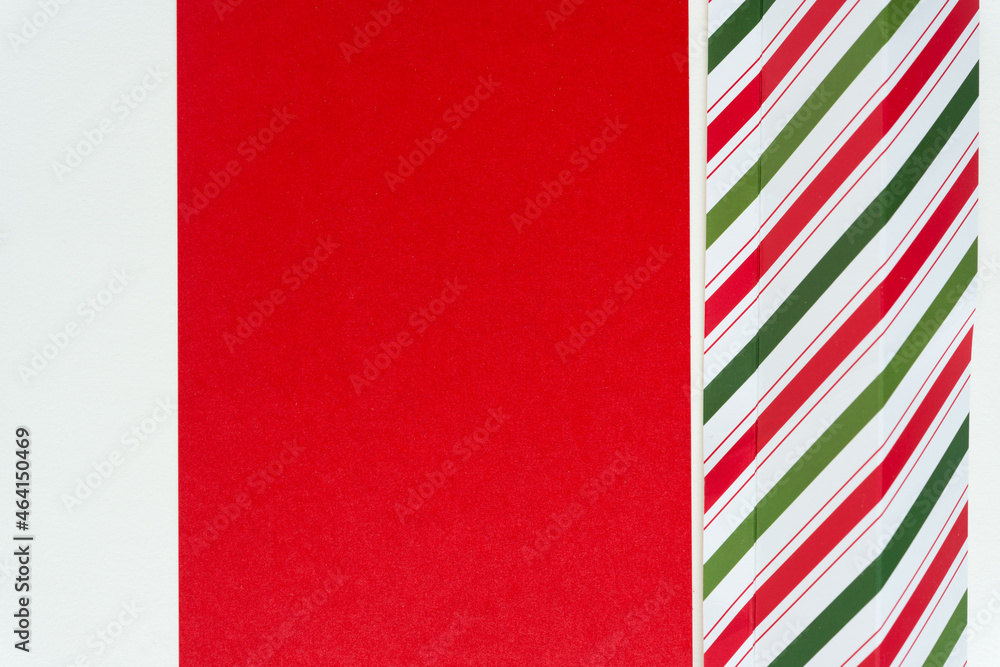 candy cane striped cardboard with space on red candy cane striped cardboard with space on red