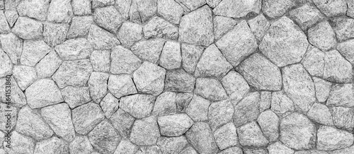 Panorama of White natural stone wall pattern and background texture