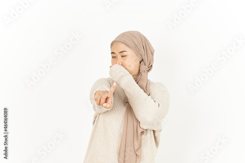Smelling something stinky and disgusting of Beautiful Asian Woman Wearing Hijab Isolated On White Background