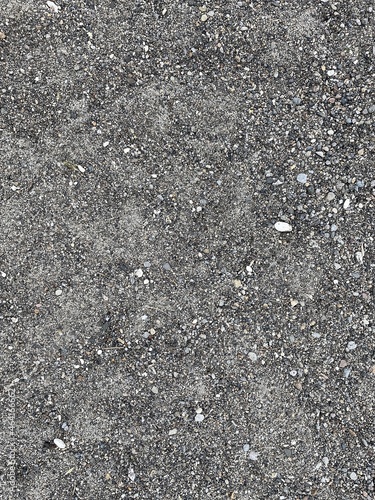 course sand on the beach tecture taken on the Taupo lake front. 