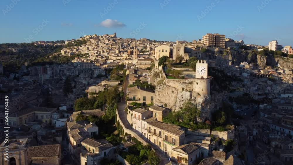 flying alongside castle towards historic Sicilian town of Modica flying alongside castle towards historic Sicilian town of Modica