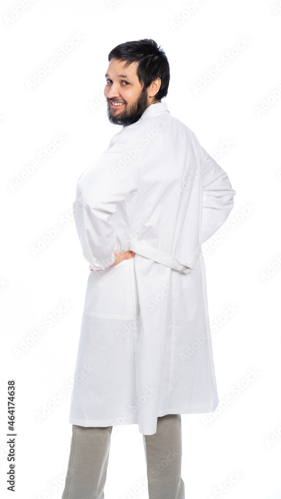 the medic stands with his back and turns to look at us. isolated. White background the medic stands with his back and turns to look at us. isolated. White background