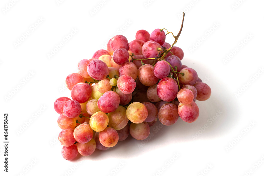 a brush of table pink grapes on a white background