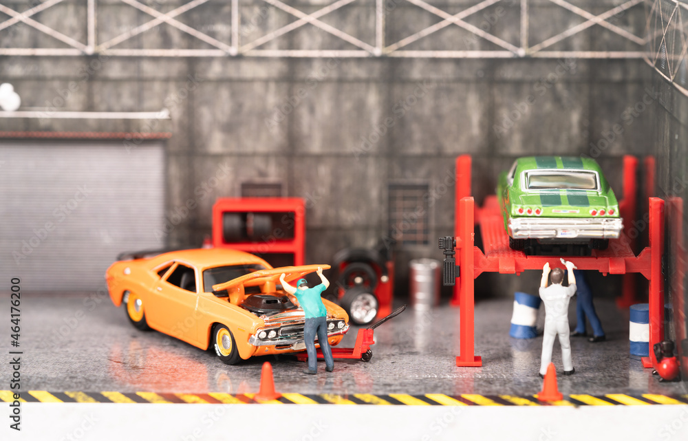 Fototapeta premium Miniature mechanics at the workshop