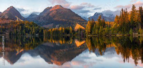 Autumn Panorama Strbske Pleso Lake. Calm, autumn evening scene of High Tatras National Park, Slovakia, Europe. #464178039