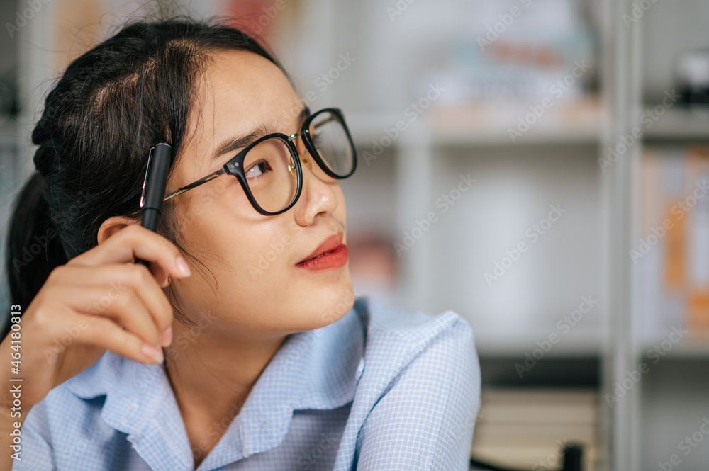 Headshot protrait smiling woman wearing eyeglasses Headshot protrait smiling woman wearing eyeglasses