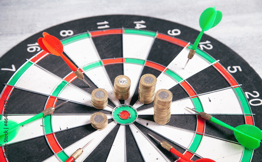 Coins and target dartboard. Business strategy. Achievement. Goals Coins and target dartboard. Business strategy. Achievement. Goals