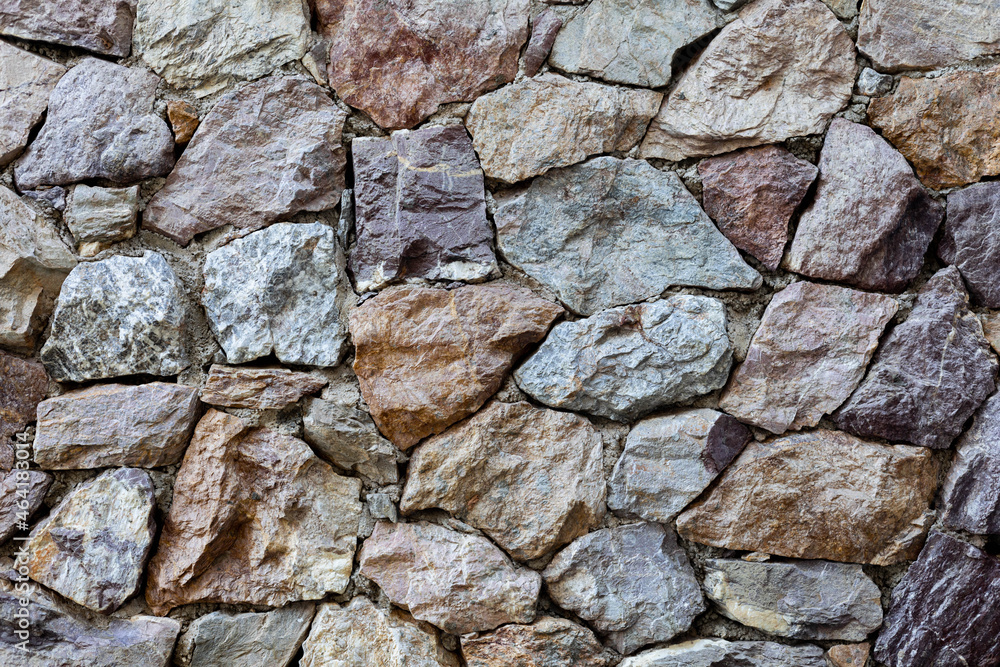 large number of stones were arranged on the stone walls. for background large number of stones were arranged on the stone walls. for background