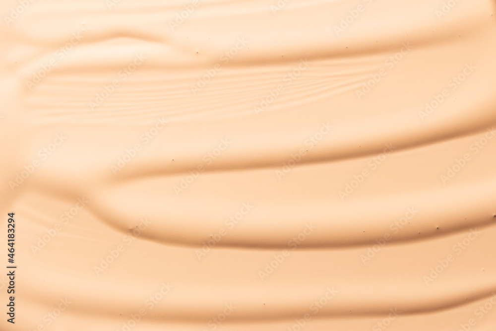 Fototapeta premium Makeup foundation background. Liquid foundation, concealer brush strokes and face powder. Makeup base, BB, CC cream texture