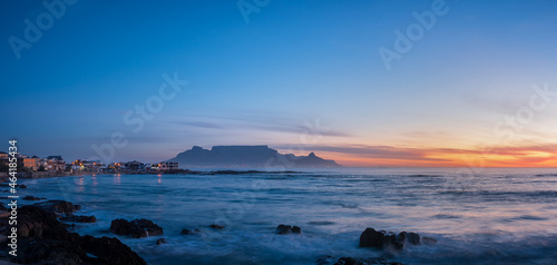 Evening view of Table Mountain viewed from Big Bay Blouberg Cape Town, Western Cape, South Africa.