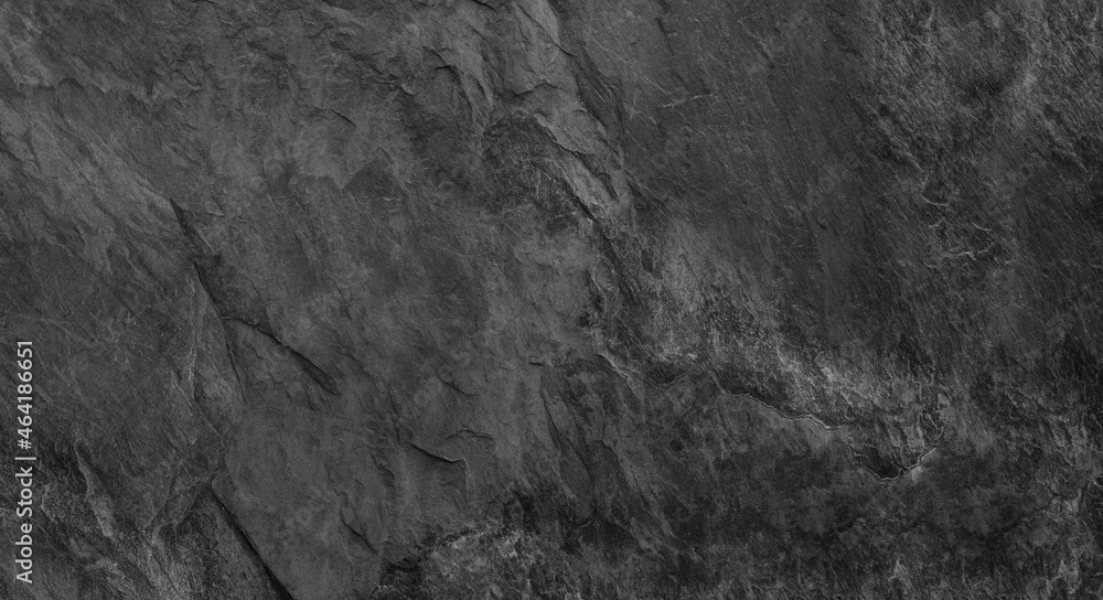 Naklejka premium Gray grunge banner. Abstract stone background. The texture of the stone wall. Close-up.