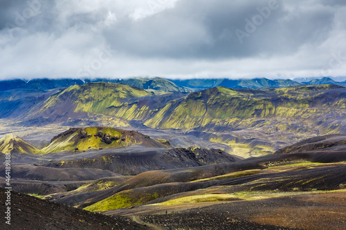 Beautiful Icelandic landscape with canyon in the mountains. Trekking in national park Landmannalaugar © olyphotostories