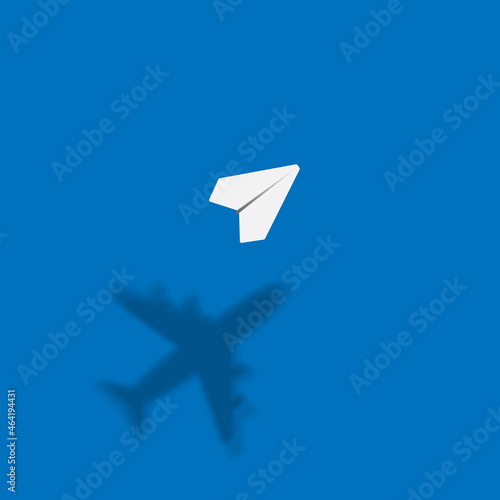 Paper plane with big realistic shadow. Dream concept