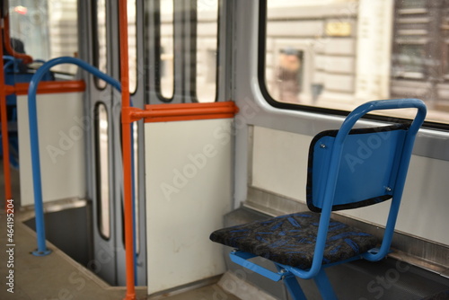 Empty blue chairs on empty tram, Riga Latvia.