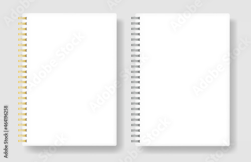 Notebooks with metal springs isolated on white background