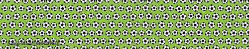 Green seamless pattern with footballs