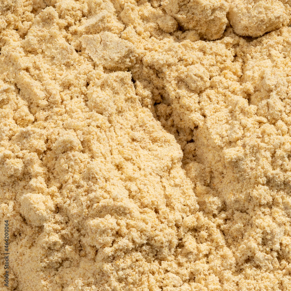 Detailed and large close up shot of powdered fenugreek Detailed and large close up shot of powdered fenugreek