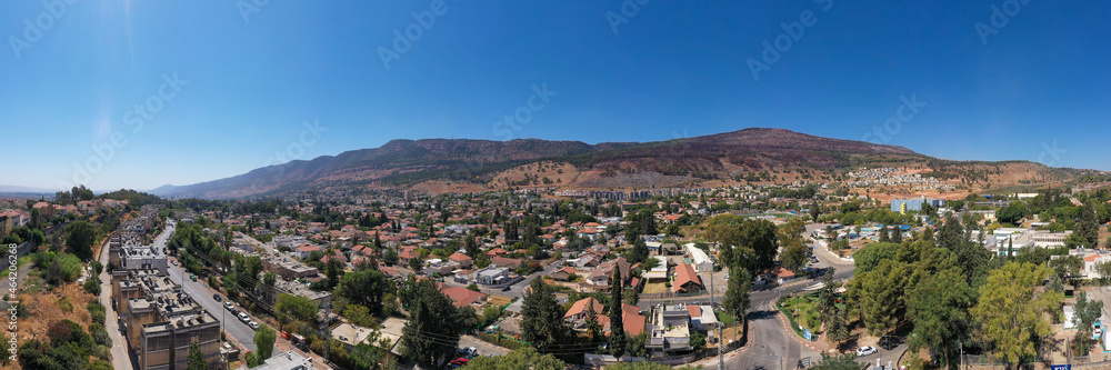 Kiryat Shmona, aerial view of the city skyline surrounded by mountains.