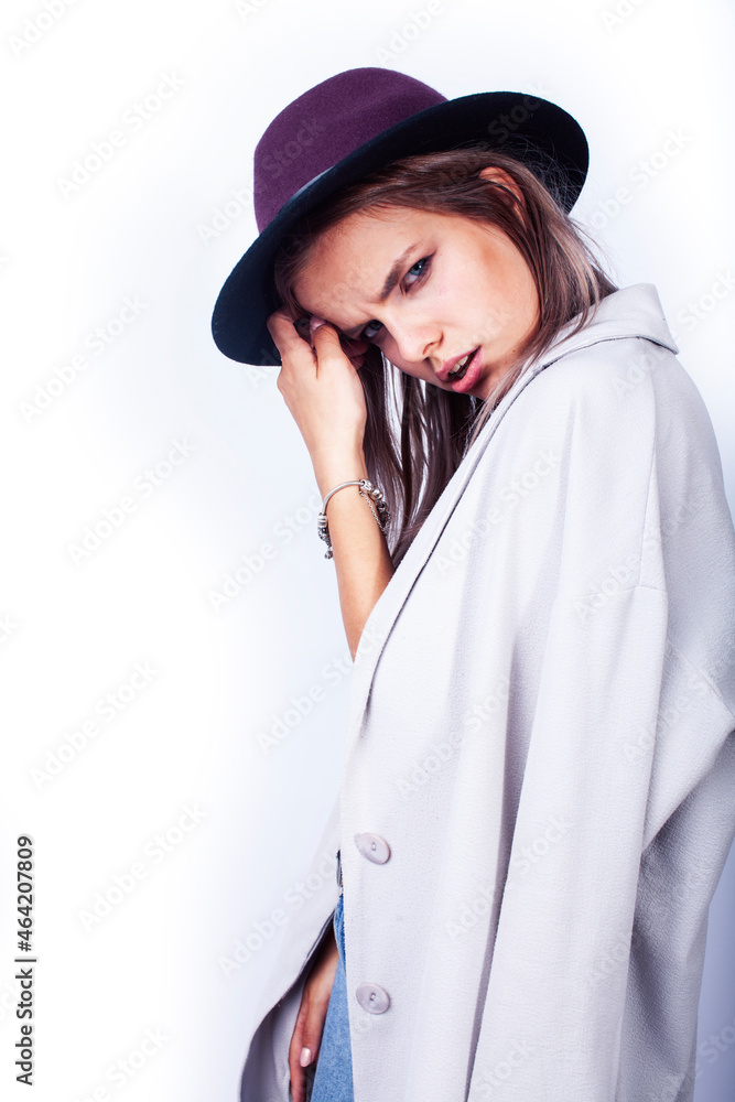 young pretty brunette girl hipster in hat on white background casual emotional posing smiling, lifestyle people concept young pretty brunette girl hipster in hat on white background casual emotional posing smiling, lifestyle people concept
