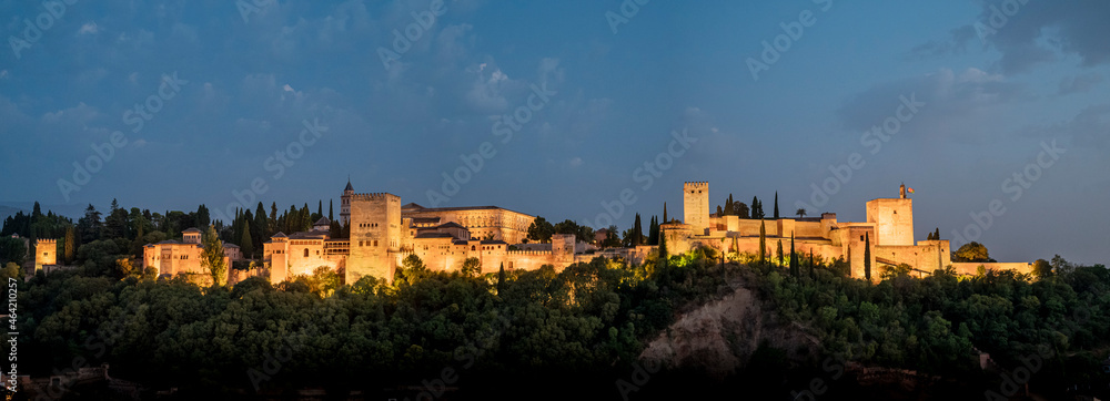 Extra-large panoramic photograph of the landscape of the monumental complex La Alhambra, blue sky