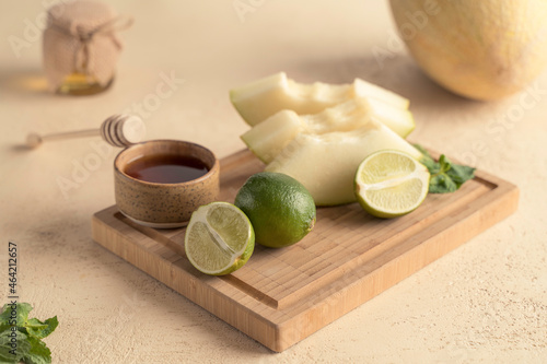 ingredients for making a drink from melon and lime