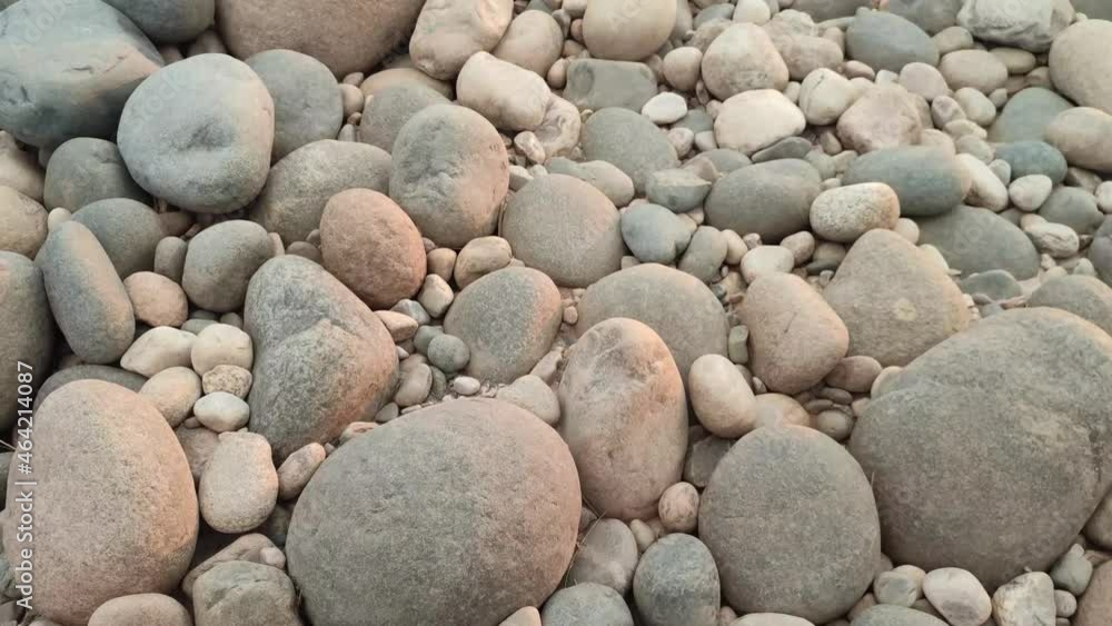 Beautiful riverside stone in the afternoon. Rock, pebble, stony, boulder.