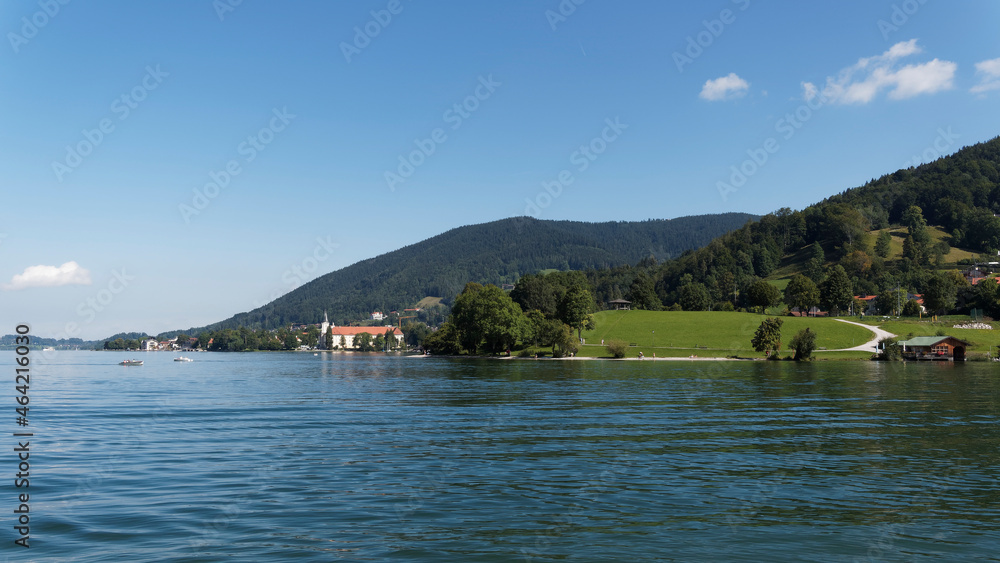 Lake of Tegernsee in Upper Bavaria (Germany) with view on Schloss and Tegernsee Benedictine Abbey from the shore of Rottach-Egern