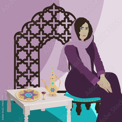 Young woman in hijab sitting on a chair in front of a table with bronze, golden oriental arabic tablewear, jug, plate, glass, with Moroccan style lattice at the back in purple, violet, turquoise, blue