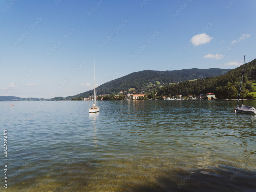 Lake of Tegernsee in Upper Bavaria (Germany) with view on Schloss and Tegernsee Benedictine Abbey from the shore of Rottach-Egern