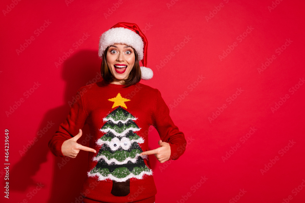Photo of young excited lady indicate fingers advise promo advent xmas spirit isolated over red color background
