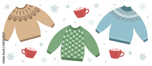 Cozy Christmas sweaters set. Winter jumpers and cocoa cups with marshmallows and snowflakes. Hygge holiday clipart.  Vector illustration isolated on white background.