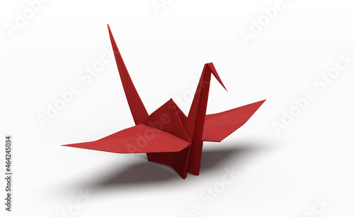 Isolated red crane bird origami.