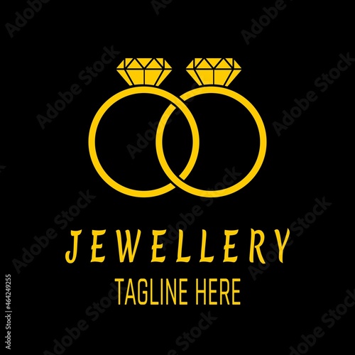 Illustration of two gold rings with gemstones, diamonds on them.  Perfect for jewelry store logos or jewelry manufacturers