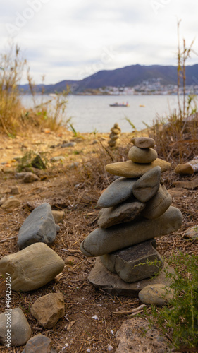 Tower of stones in cala bramant in Llanca photo