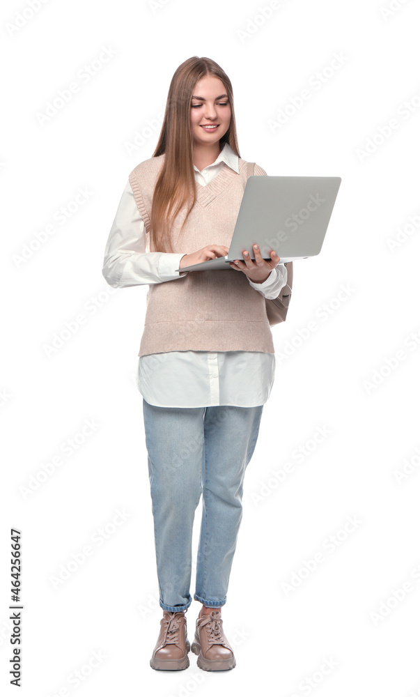 Teenage student with backpack using laptop on white background Teenage student with backpack using laptop on white background