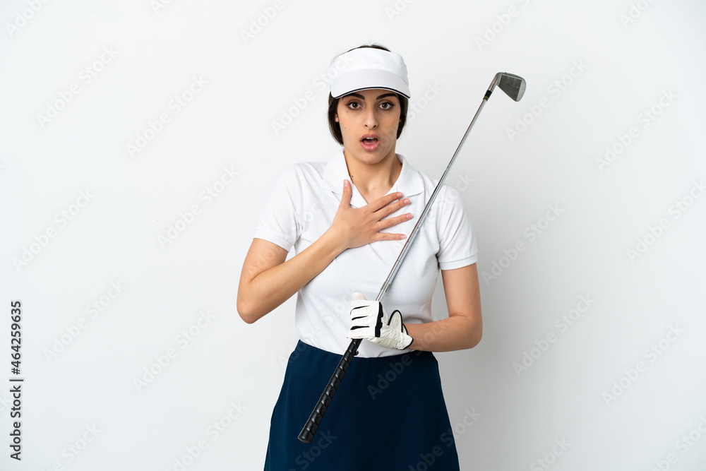 Handsome young golfer player woman isolated on white background surprised and shocked while looking right Handsome young golfer player woman isolated on white background surprised and shocked while looking right