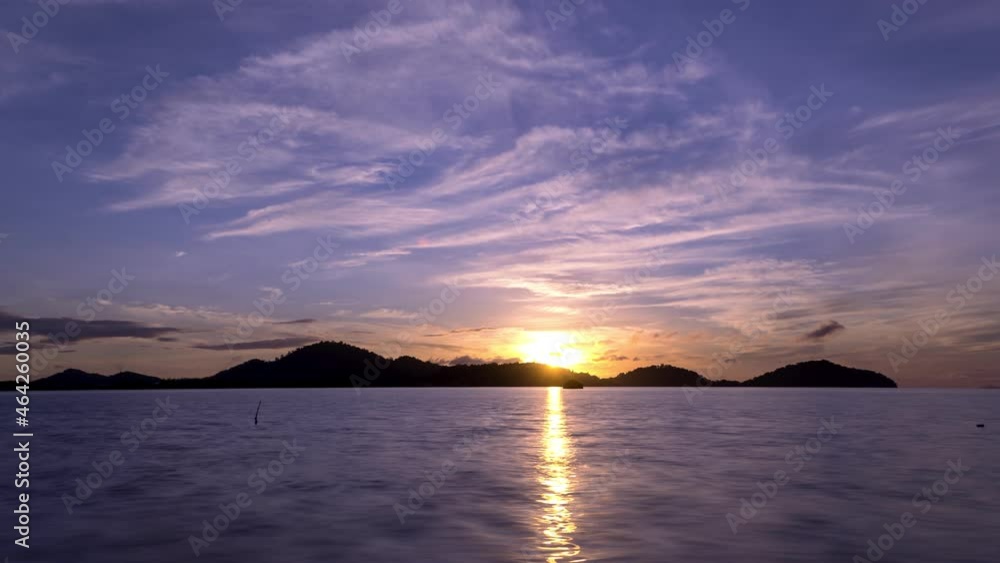 Time lapse during sunrise of sea beach beautiful cloud at saphanhin in Phuket Thailand Time lapse during sunrise of sea beach beautiful cloud at saphanhin in Phuket Thailand