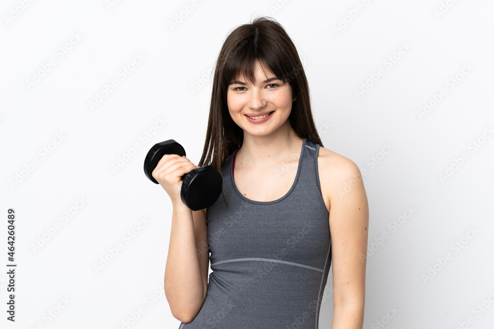 Ukrainian sport girl making weightlifting isolated on blue background smiling a lot Ukrainian sport girl making weightlifting isolated on blue background smiling a lot
