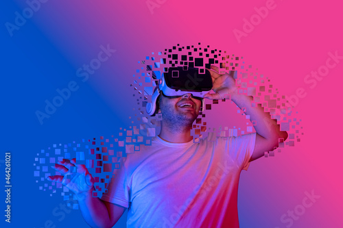 young man enters virtual world with vr glasses. Introduction to the new future metaverse universe.