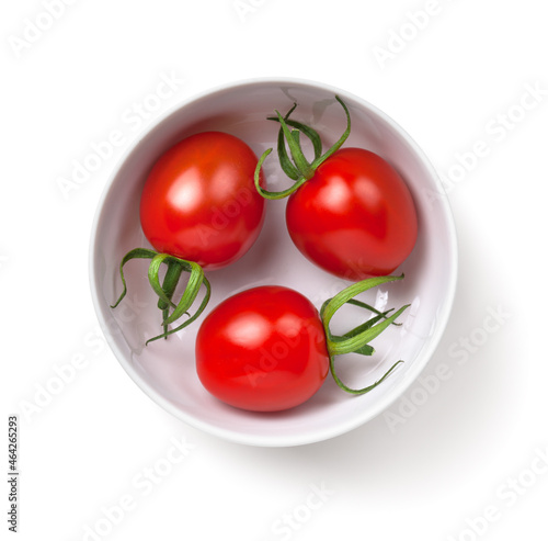 Three Cherry Tomatoes In White Bowl Isolated
