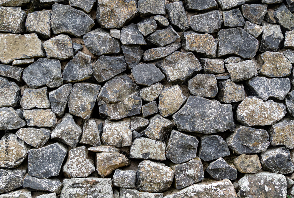 Natural stone wall made from field stones Natural stone wall made from field stones