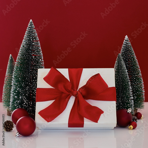 Composition with Christmas decorations onred background photo