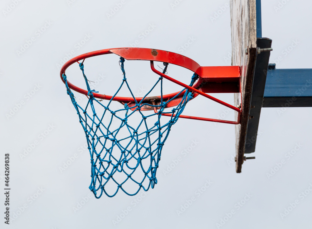 Basket with a net for basketball.