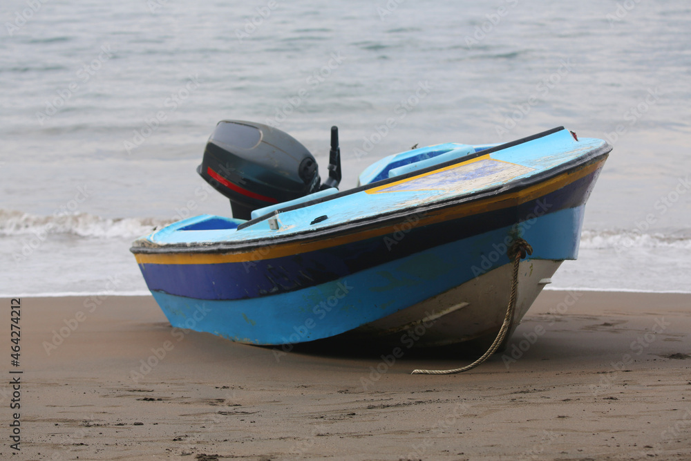 damaged boat stranded on the shore damaged boat stranded on the shore