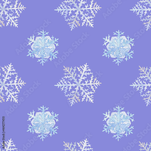 Watercolor seamless pattern with blue snowflakes. Suitable for wrapping paper, holiday cards and other designs