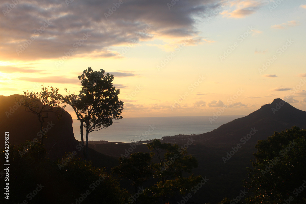 View of sunset on the west coast of Mauritius from  a viewpoint in Black River Gorges National Park, Mauritius