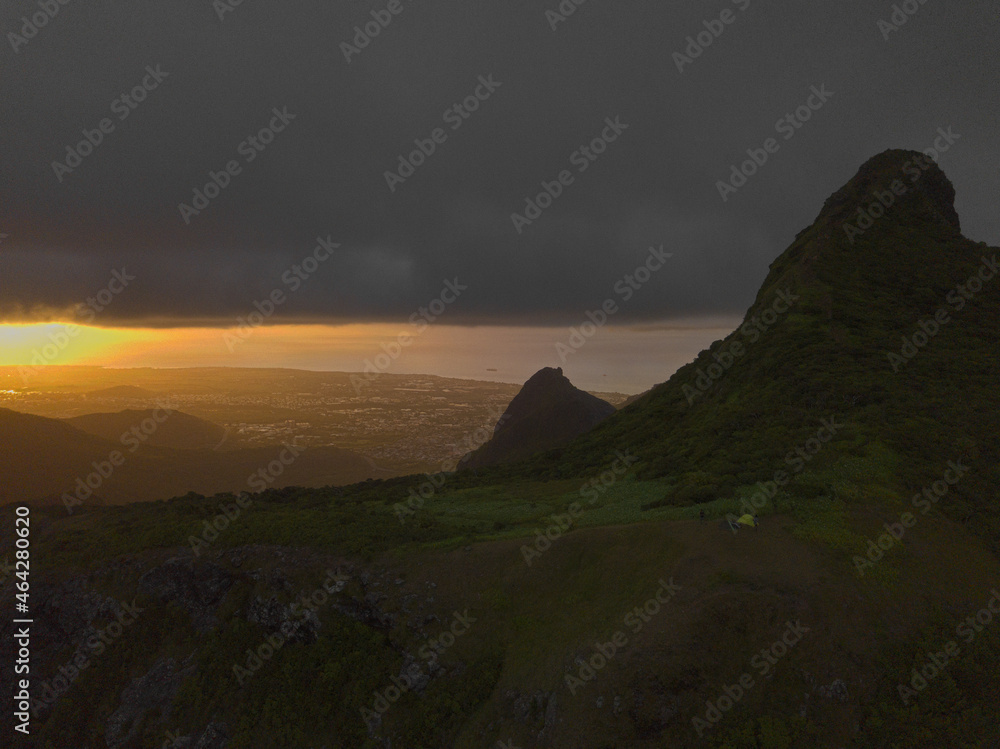 Aerial view of 'Le Pouce' mountain during cloudy sunset in Mauritius