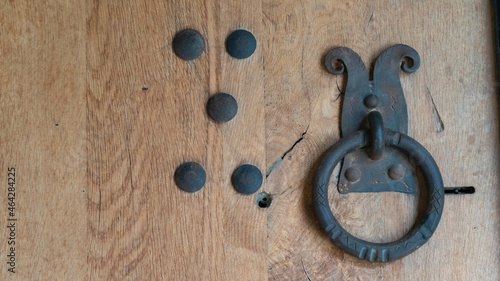 antique door. iron handles on the old door