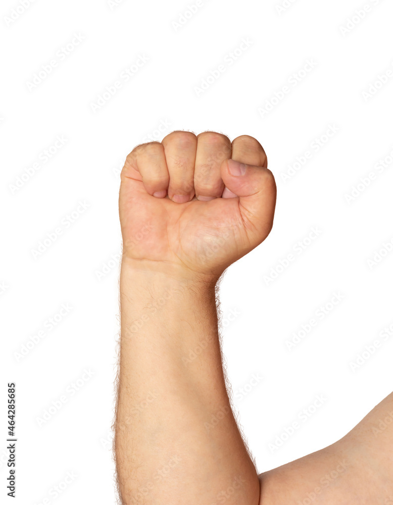 Fingers clenched into a fist. Man's hand. Isolated on a white background. Fingers clenched into a fist. Man's hand. Isolated on a white background.
